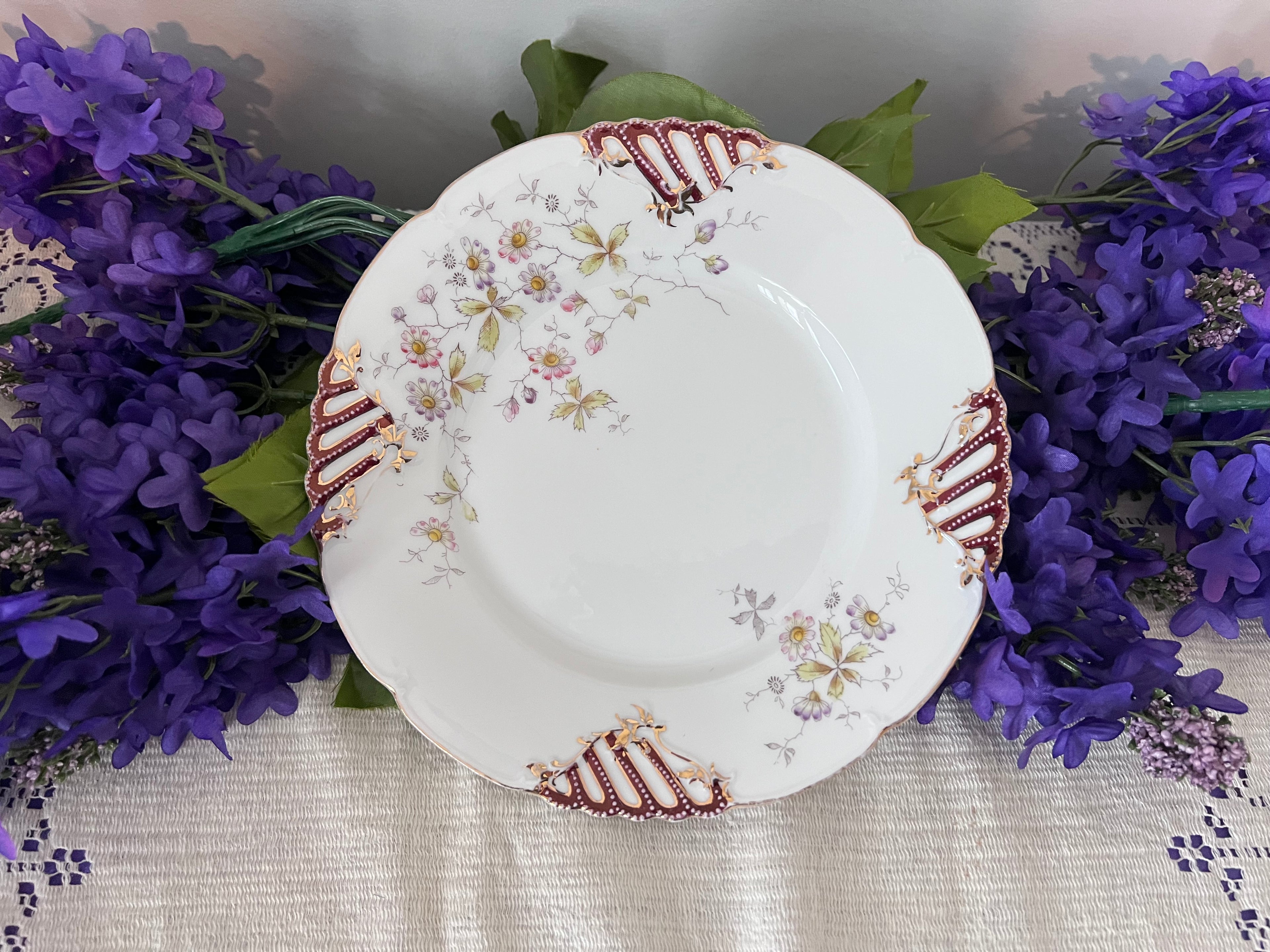 Antique German Porcelain Cabinet Plate – Pierced Burgundy & Gold Lattice Rim – Delicate Wildflower Floral Spray – Hand-Painted "QQ" Mark