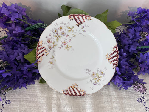 Antique German Porcelain Cabinet Plate – Pierced Burgundy & Gold Lattice Rim – Delicate Wildflower Floral Spray – Hand-Painted "QQ" Mark